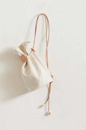
                  
                    Jujumade × ARCHI Cinch Backpack / Canvas
                  
                