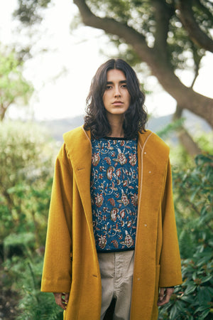
                  
                    Angola Shaggy Coat
                  
                